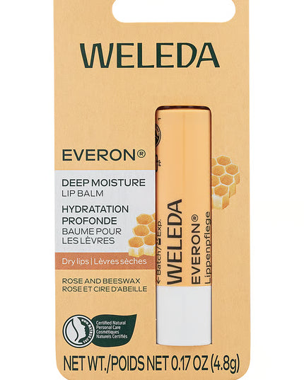 Weleda Everon Deep Moisture Lip Balm packaging on a beige background