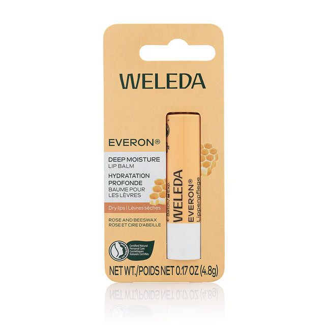 Weleda Everon Deep Moisture Lip Balm packaging on a beige background