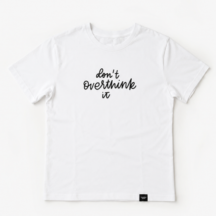 White t-shirt with 'Don't Overthink It' text on a white background