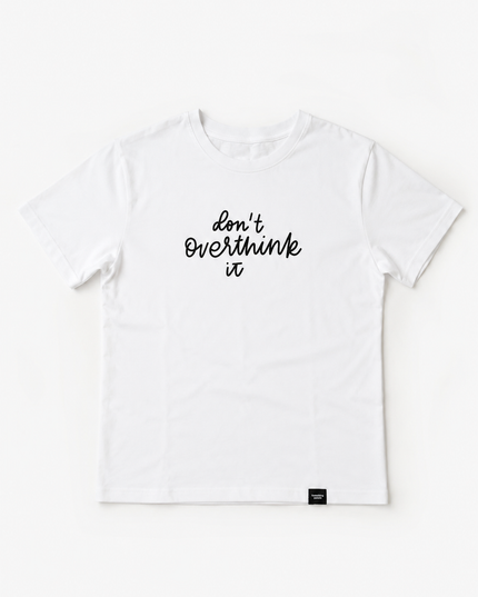 White t-shirt with 'Don't Overthink It' text on a white background