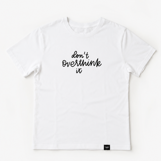 White t-shirt with 'Don't Overthink It' text on a white background