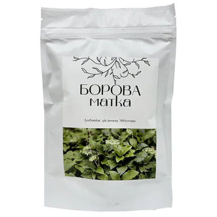 White packaging with green leaf image and text on a white background